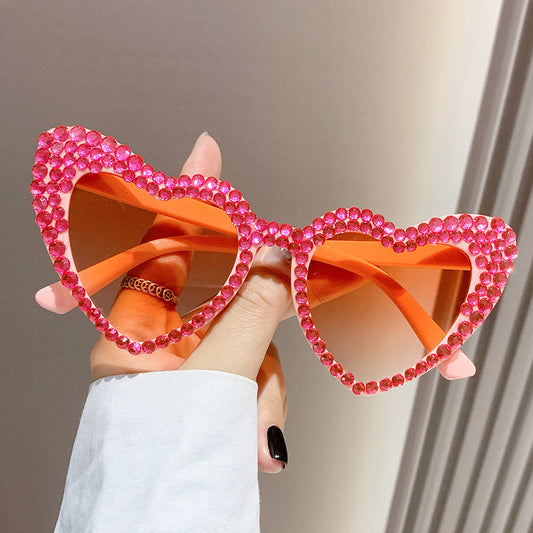 Heart‑eye sunglasses
